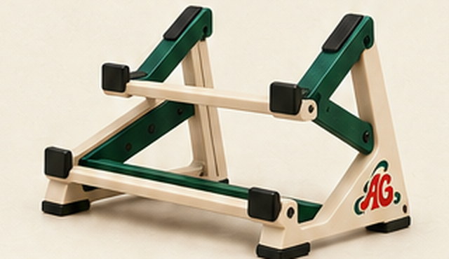 An ivory two-tier stand frame with green cross braces, seen from the side